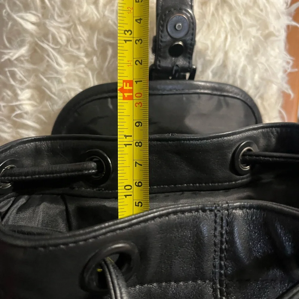 Vintage 90’s Tumi drawstring leather mini backpack